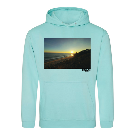 Sudadera con capucha de espuma de mar azul de la costa del Pacífico