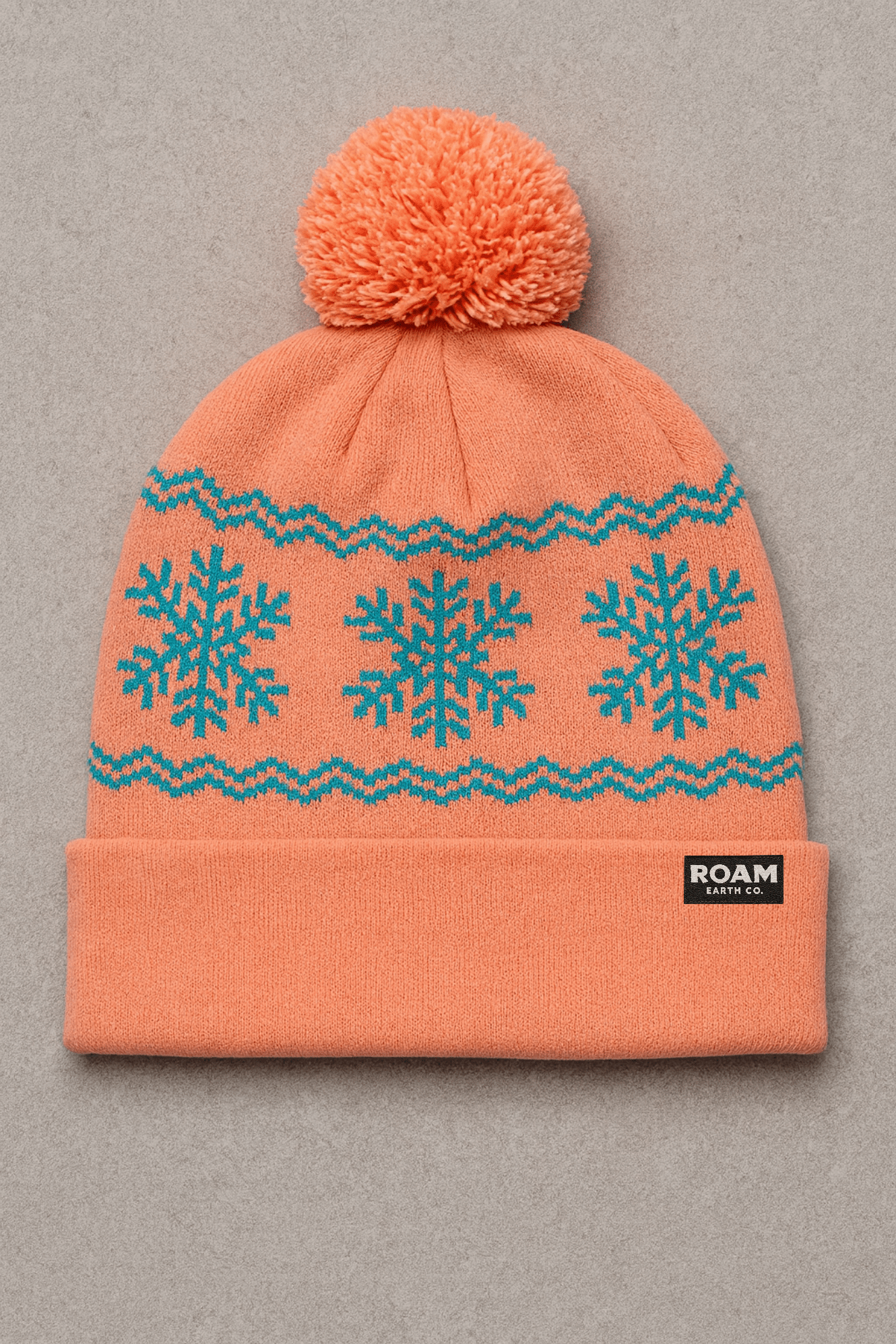 Coral and Seafoam Pom Snowflake Beanie - Roam Earth Co.